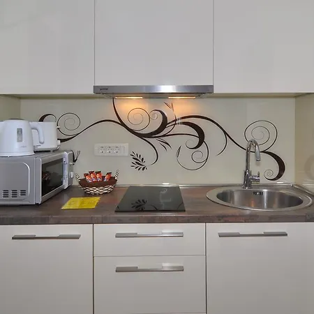 Deluxe & Sarella Appartement *