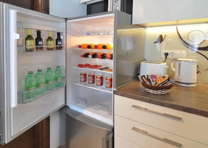 Deluxe & Sarella Апартаменты *